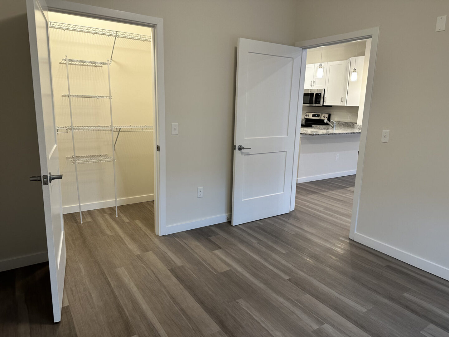 hallway to the pantry and kitchen