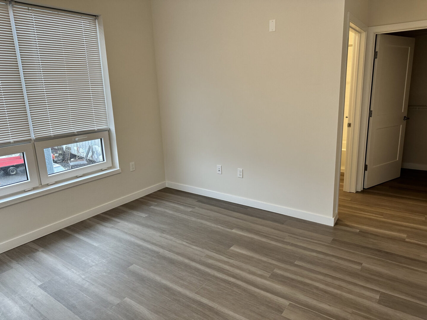 room hallway with wooden floor tiles