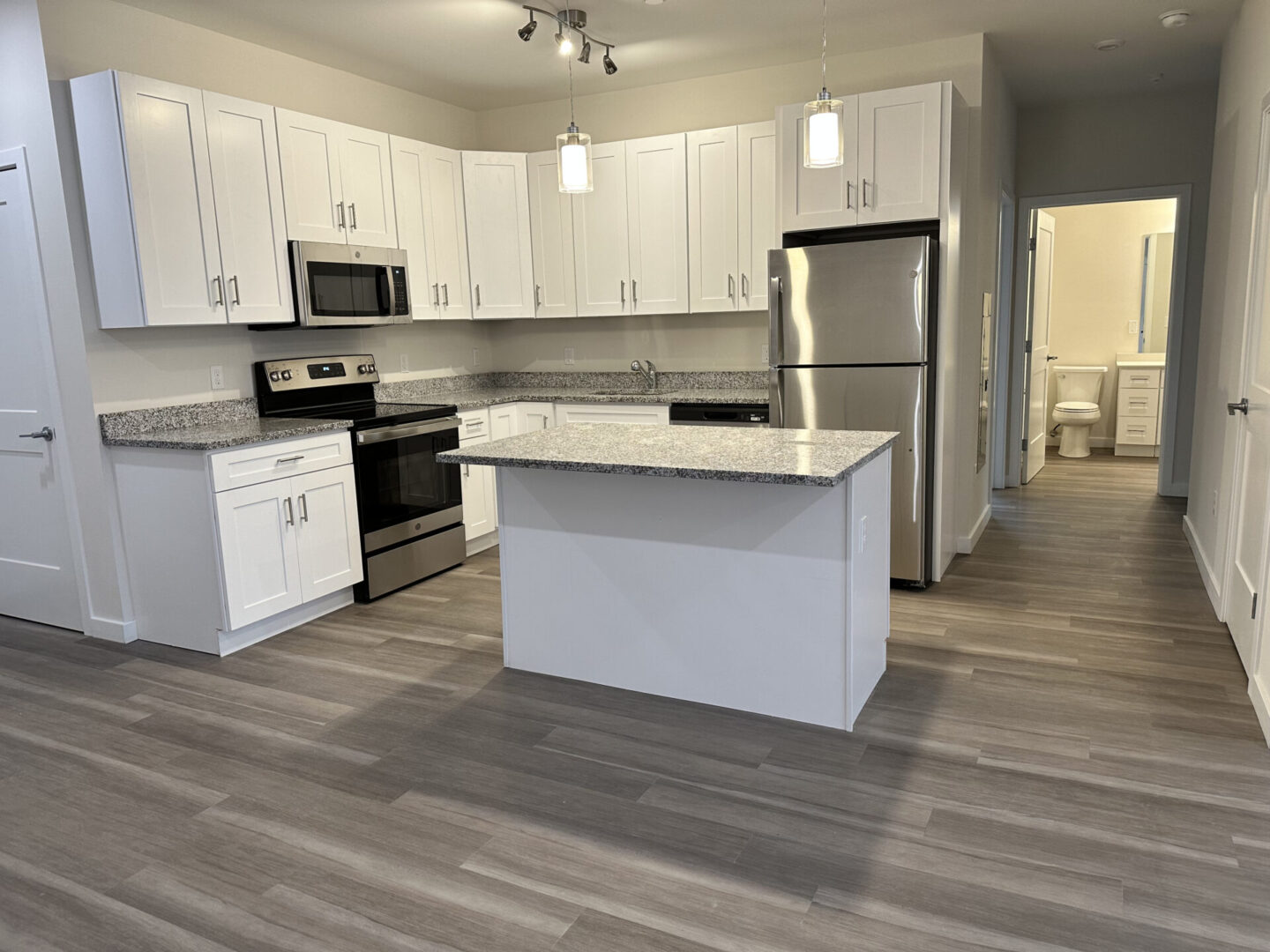 kitchen with entrance to a bathroom